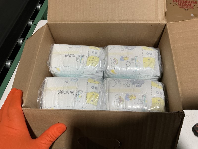 Condition photo showing New/Like New for pampers swaddlers diapers, size 0 (up to 10 lbs), 140 count, absorbent, keeps baby dry and comfortable, skin safe disposable baby diaper (packaging may vary) newborn 140