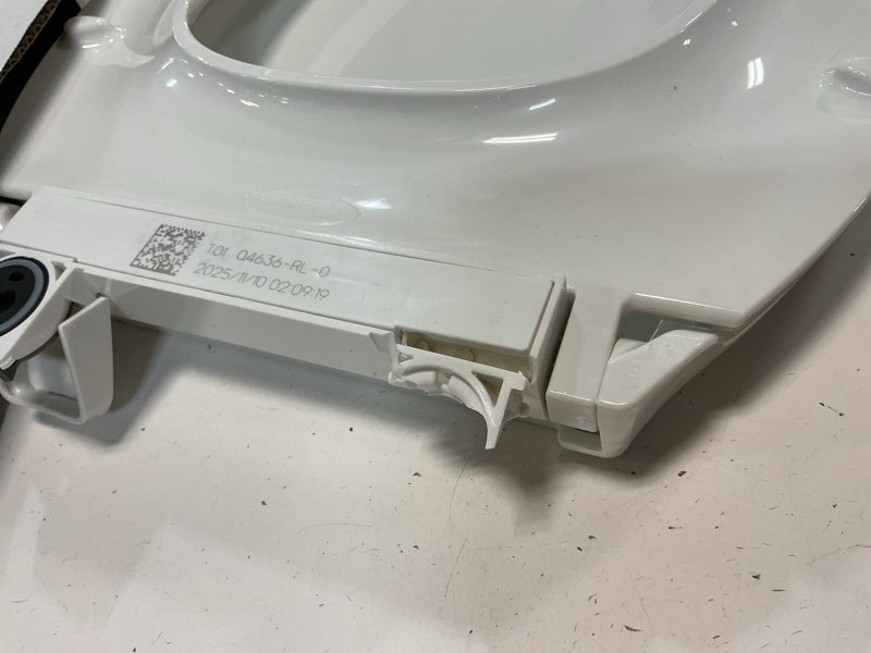 Condition photo showing As Is for KOHLER 4636-RL-0 Cachet ReadyLatch Elongated Toilet Seat Slow Close, Soft Close Toilet Seat Quiet Lid, Contoured Grip-Tight Bumpers Installation Hardware, Apartment Essentials, White White Elongated Ready Latch