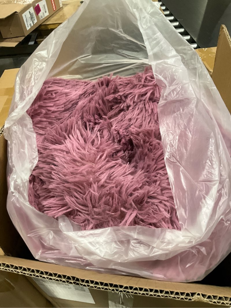 Condition photo showing New/Like New for fluffy warm comfortor (purple
