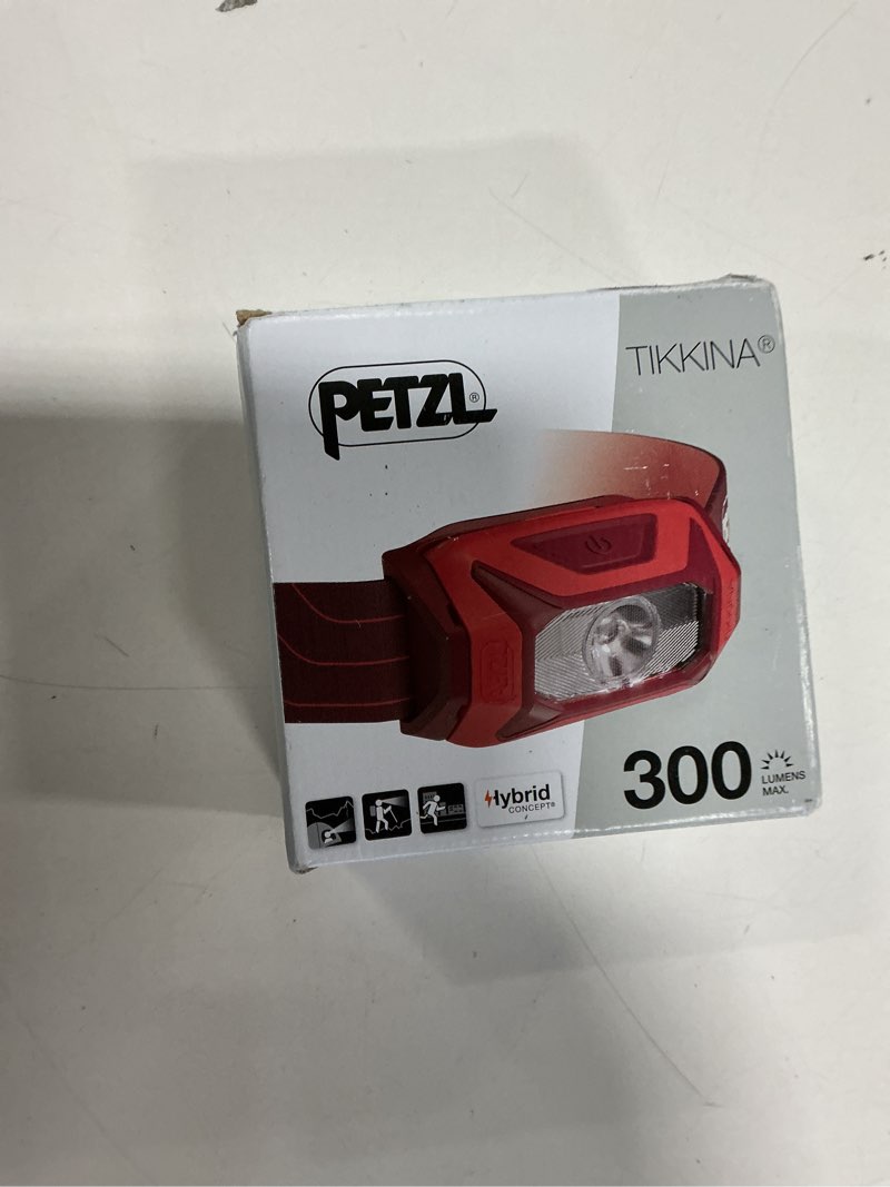 Condition photo showing New/Like New for PETZL TIKKINA Headlamp - Compact, Easy-to-Use 300 Lumen Headlamp, Designed for Hiking, Climbing, Running, and Camping Green One Size 300 Lumens