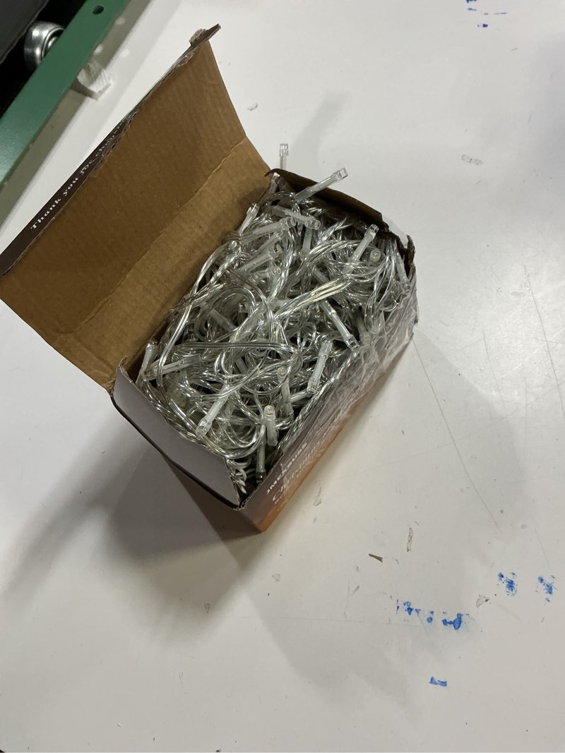 Condition photo showing As Is for JMEXSUSS 200 LED Christmas Lights Indoor Outdoor, Connectable Warm White Christmas Tree Lights Clear Wire, 66 Ft Twinkle Fairy String Light Plug in for Bedroom Wedding Xmas Tree Decorations