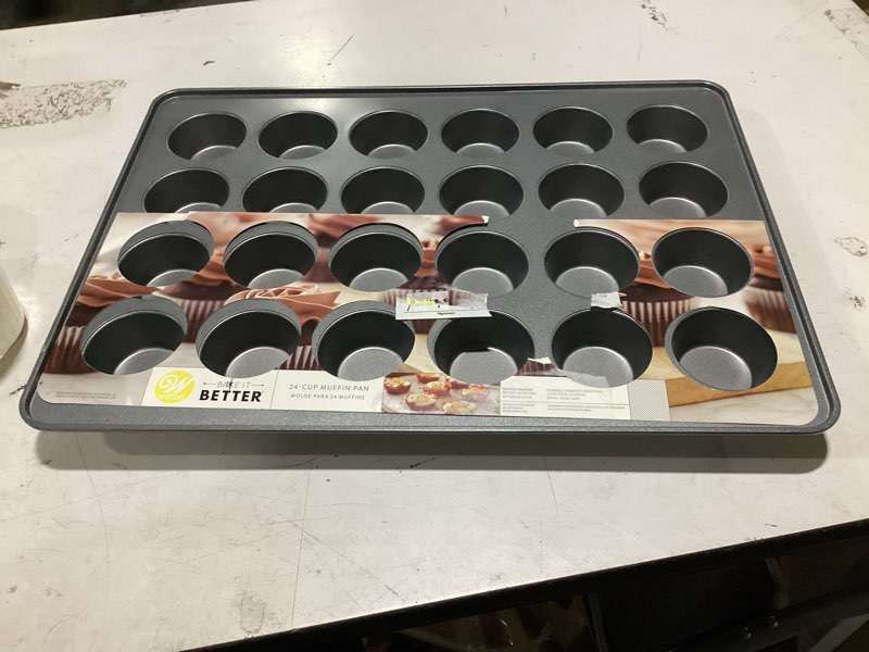 Condition photo showing Good Condition for wilton bake it better non-stick muffin and cupcake pan, 24-cup