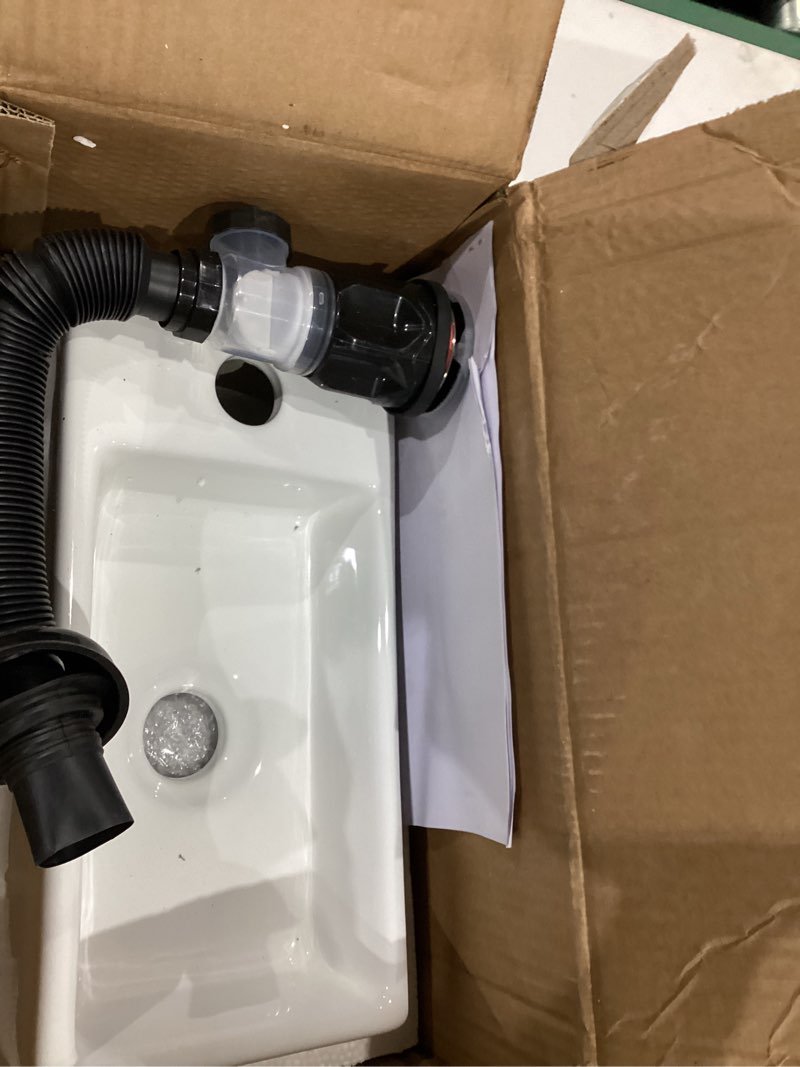 Condition photo showing Good Condition for white wall mounted ceramic bathroom sink, 7" x 14" rectangle floating porcelain vessel sink with black faucet and pop up drain set for small bathroom, left hand