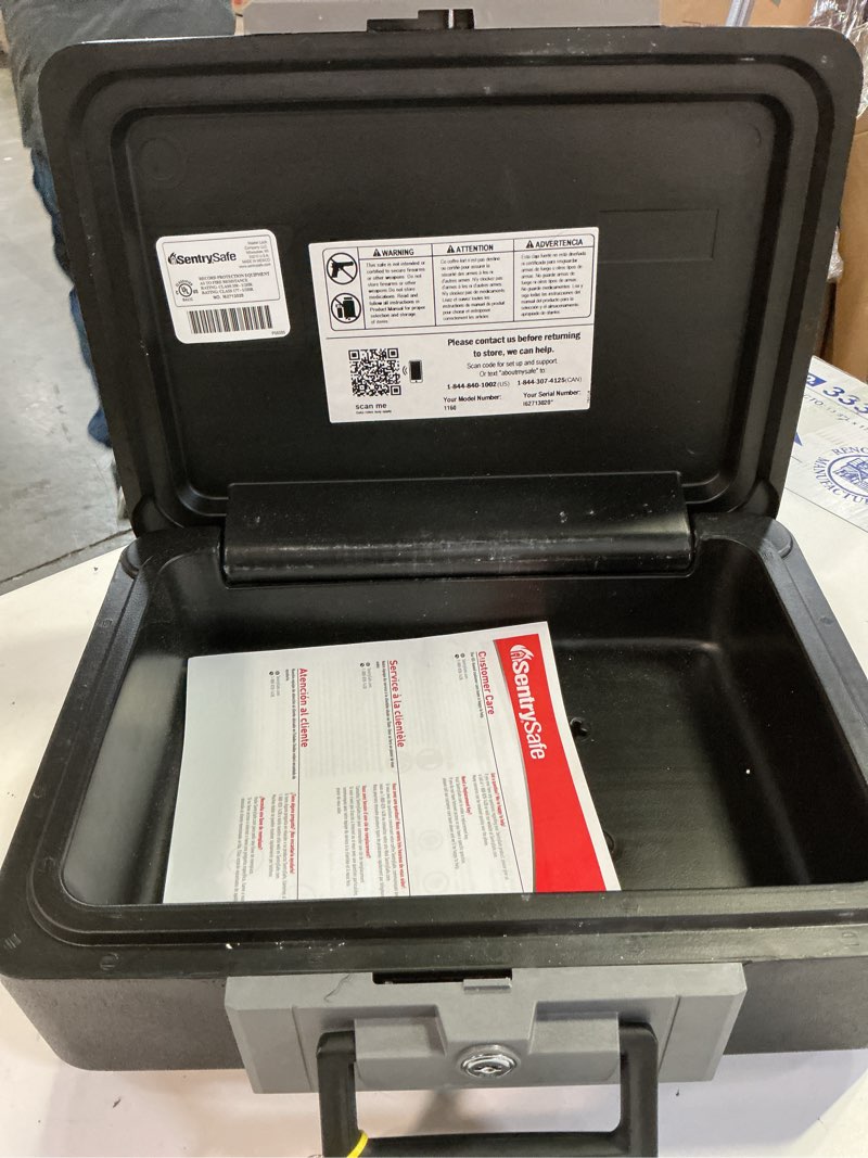 Condition photo showing Good Condition for sentrysafe fireproof safe box with key lock, chest safe with carrying handle to secure money, jewelry, documents, 0.25 cubic feet, 6.3 x 15.3 x 12.1 inches, 1160 fire resistant box 0.25 cu. ft.
