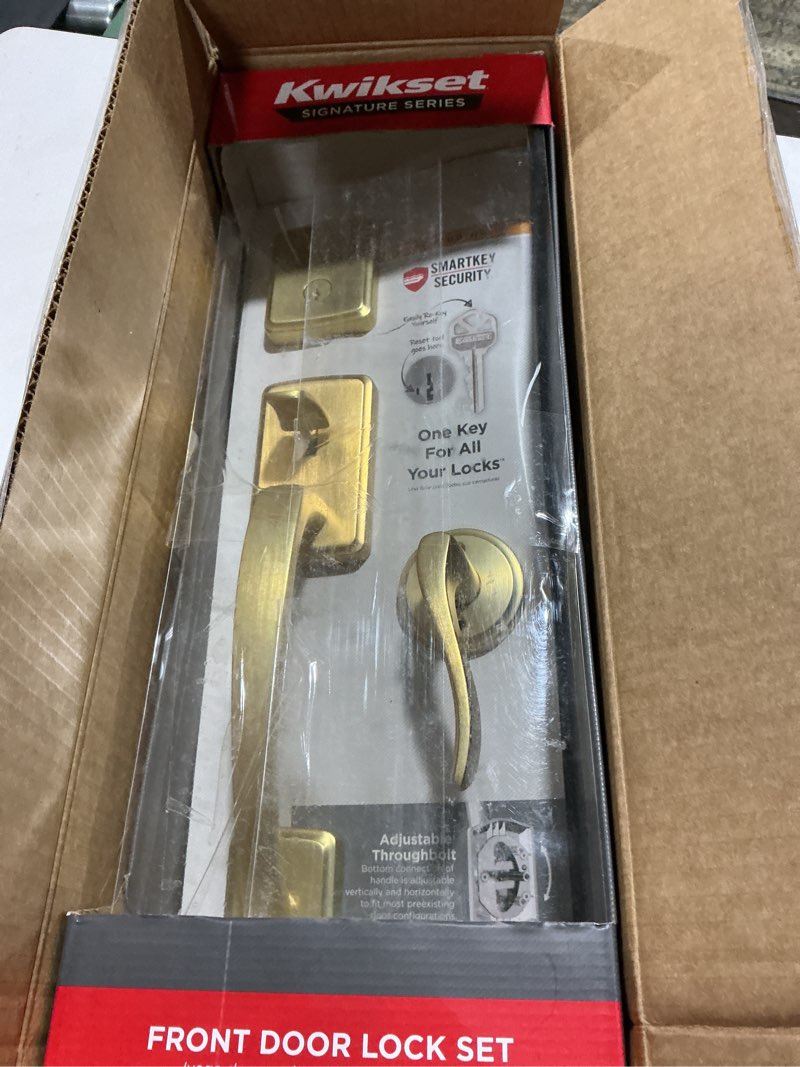 Condition photo showing Good Condition for Kwikset Brentford Front Door Lock Handle and Deadbolt Set, Entry Handleset Exterior with Sedona Reversible Lever, Satin Brass, Pick Resistant SmartKey Rekey Deadbolt Security, with Microban Protection Satin Brass With Deadbolt