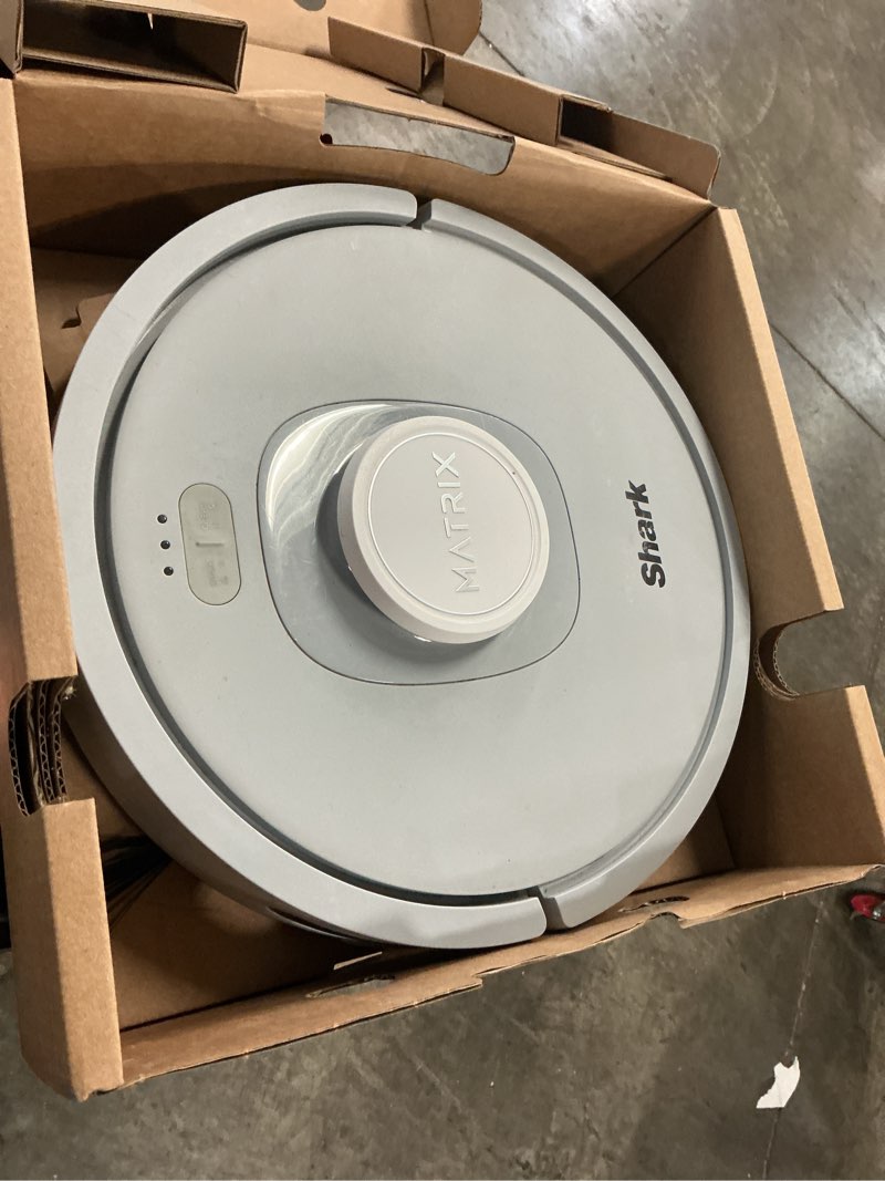 Condition photo showing As Is for shark matrix self-emptying robot vacuum with 30 day dock, precision home mapping