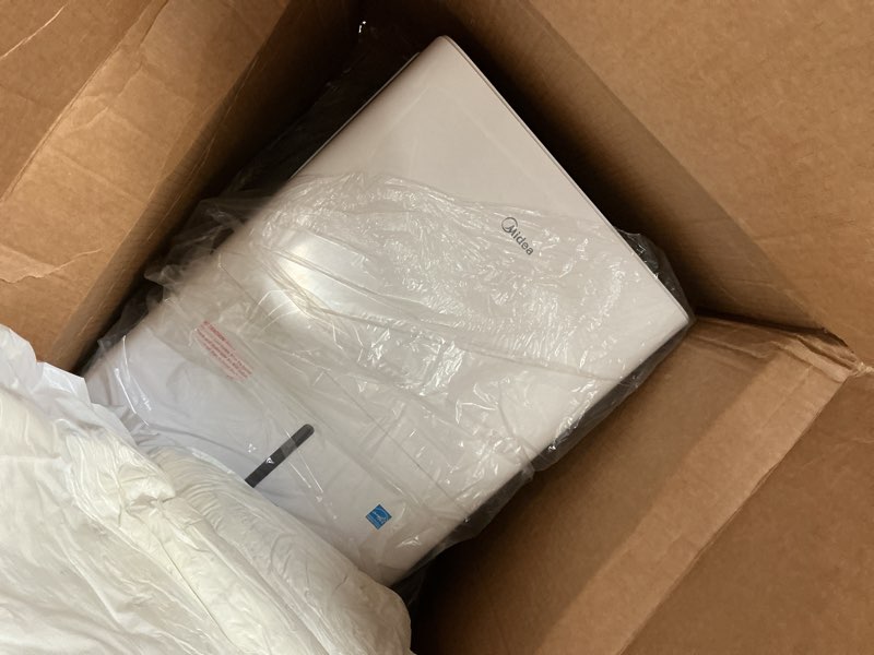 Condition photo showing As Is for Midea 4,500 Sq. Ft.Dehumidifier for Basement, With Reusable Air Filter 50 Pint - Ideal For Basements, Large & Medium Sized Rooms, And Bathrooms (White) 4,500 Sq. Ft. - WiFi