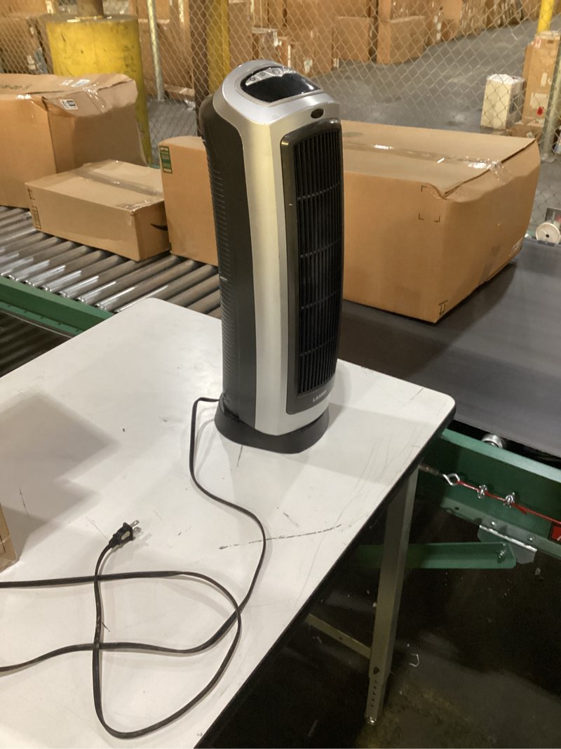 Condition photo showing As Is for (Tested works no remote)Lasko 1500W Ceramic Tower Space Heater with Remote, Thermostat, Timer & Widespread Oscillation, Port