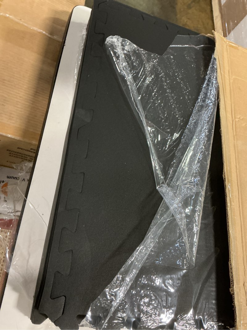 Condition photo showing As Is for SUPERJARE 0.56 Inch Thick Exercise Equipment Mats, 6 Tiles EVA Foam Mats with Rubber Top, Interlocking Rubber Floor Tiles for Home Gym and Fitness Room, Protective Flooring Mat, 24 in x 24 in, Black Black 6 Tiles (24 Sq Ft)