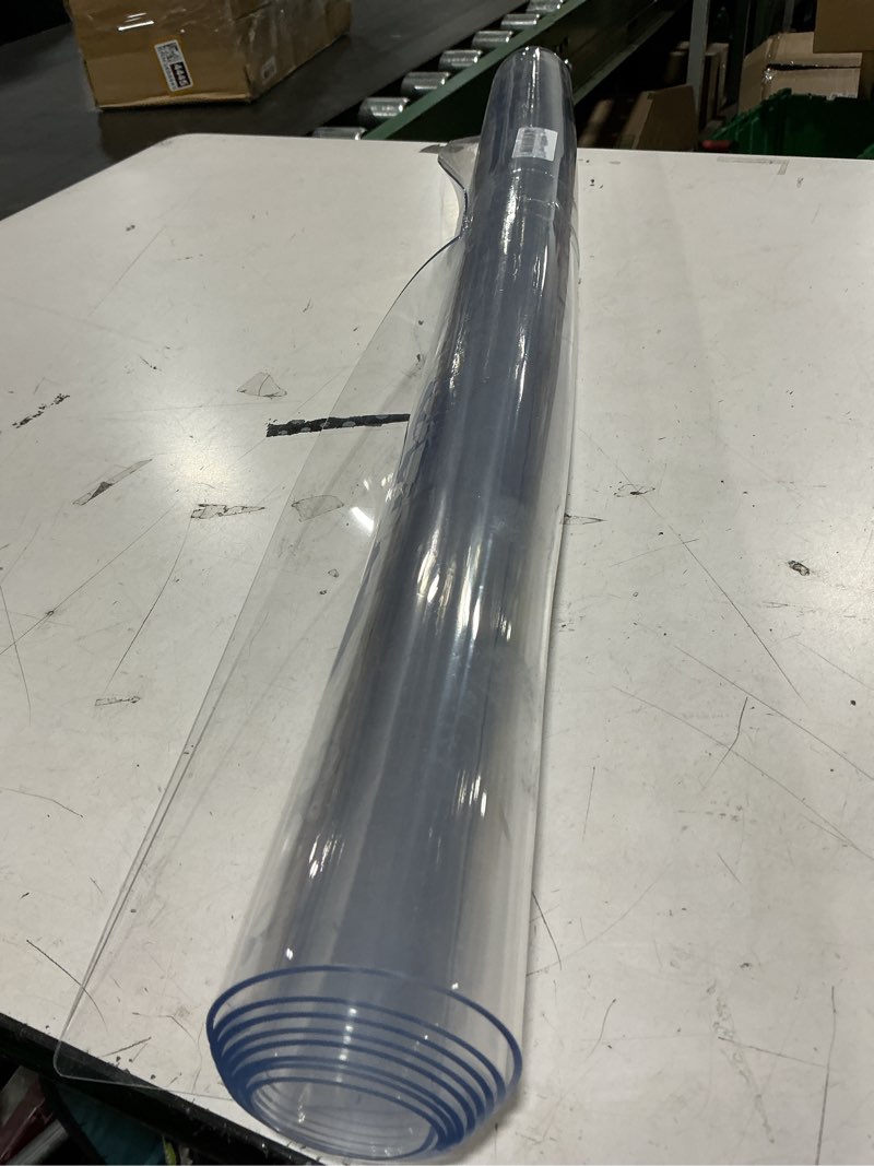 Condition photo showing As Is for 32 x 54 inch clear table cover protector, 2mm thick clear table protector for dining room table, plastic table cover, waterproof table pad for kitchen, office clear 2mm 32" x 54"