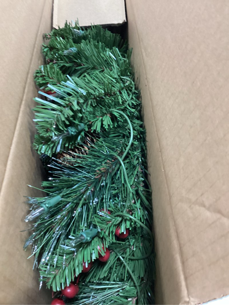 Condition photo showing Good Condition for national tree company 24 in pre-lit crestwood spruce artificial christmas wreath, christmas decoration with glitter, pinecones, red berries, 50 clear lights, 160 tips, green 24 in plug in wreath