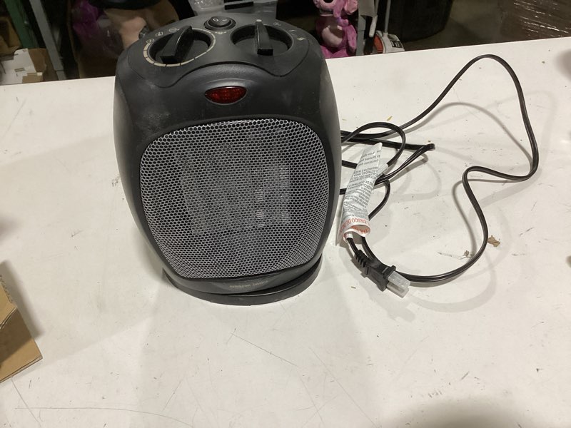Condition photo showing As Is for amazon basics oscillating ceramic space heater, portable indoor heating solution, with overheat and tip-over protection, thermostat, 1500w, 7.52"d x 6.34"w x 9.45"h, black oscillating black