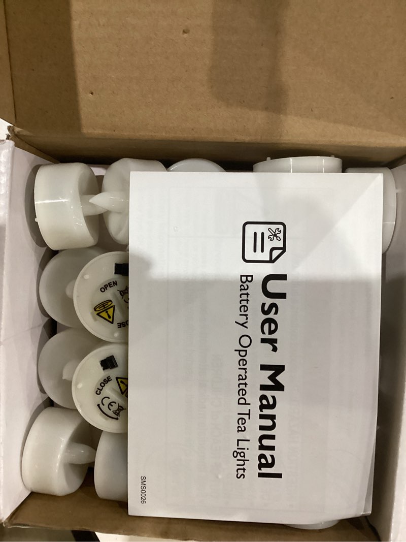 Condition photo showing As Is for led candles, 50pack tea lights candle battery operated bulk, flameless tealight candle, realistic tea lights for christmas halloween wedding diwali decor, 1.5'' d x 1.25'' h, warm yellow warm yellow 50-pack
