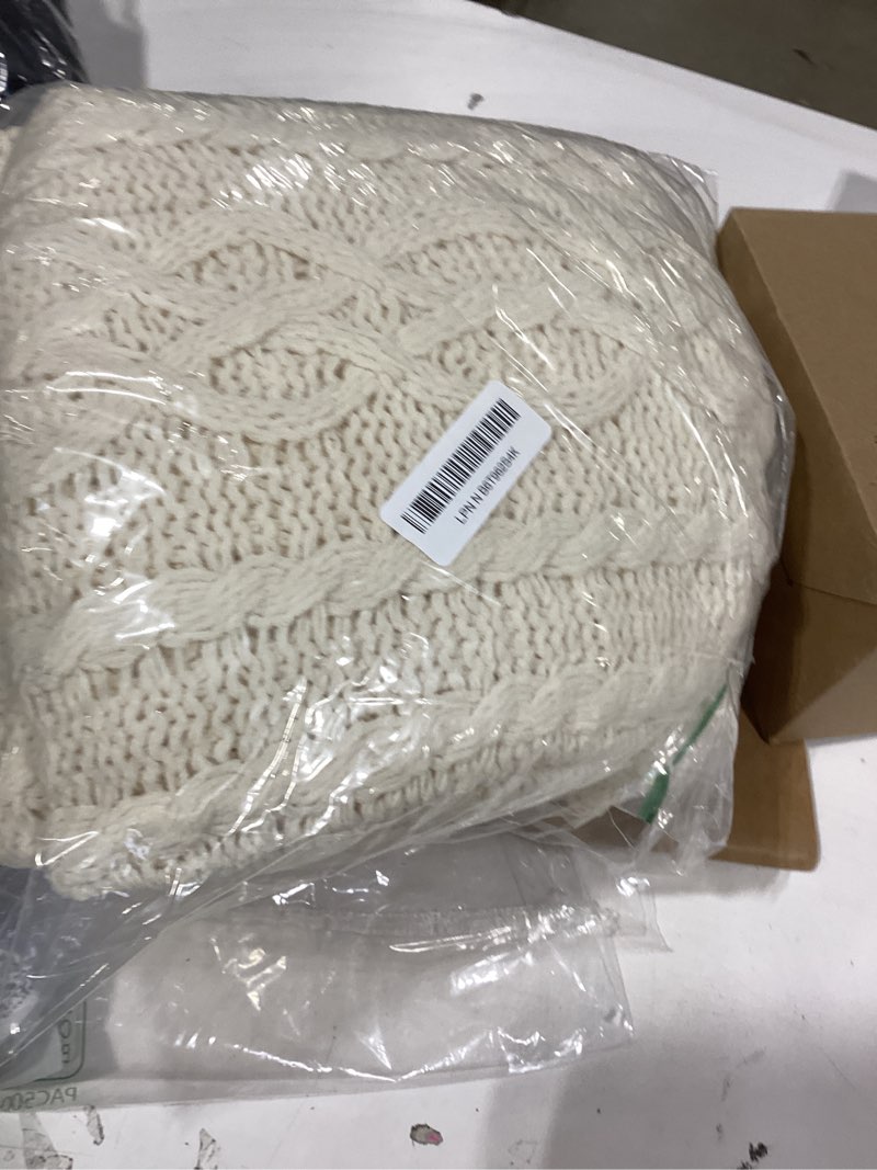 Condition photo showing New/Like New for battilo cream white ivory throw blanket for couch, 51x 67 inch, woven chenille knit throw blanket for chair, super soft warm decorative textured throw blanket for bed, sofa and living room.
