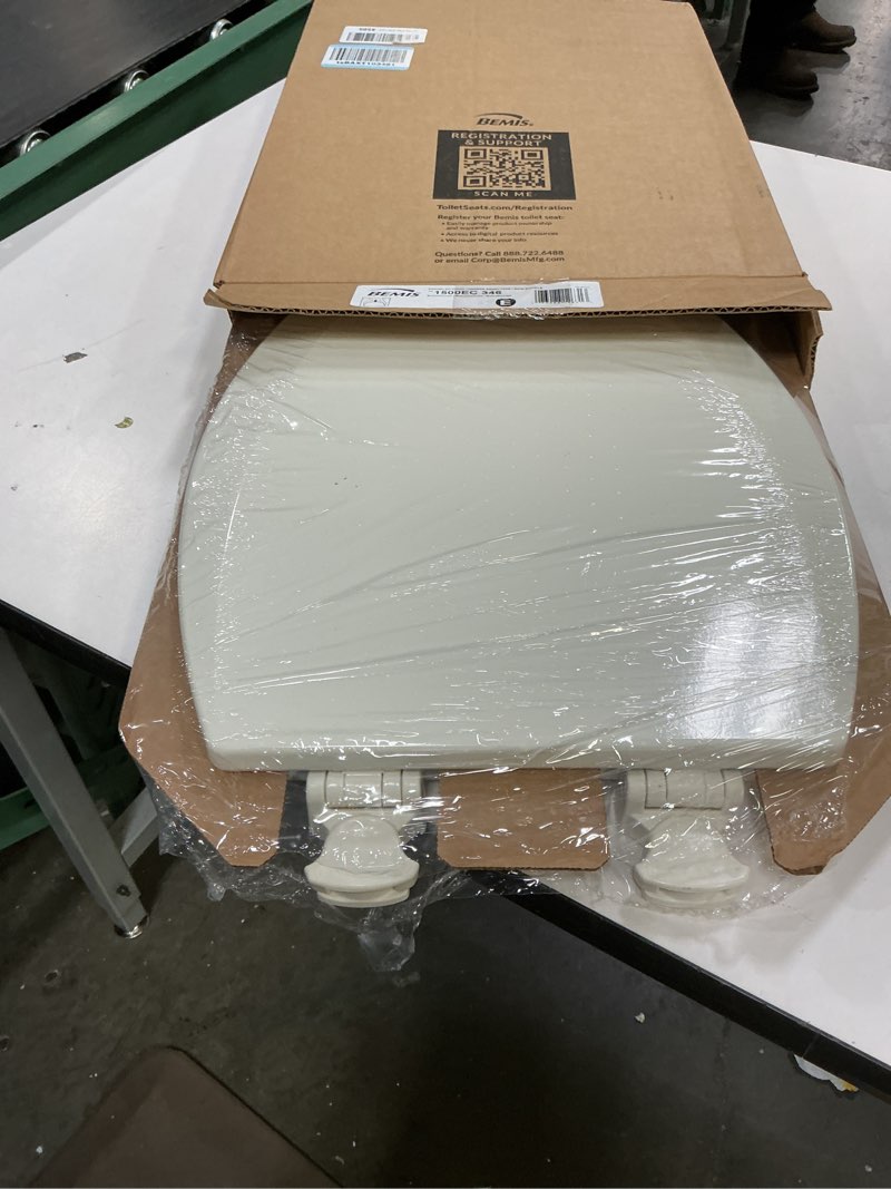 Condition photo showing Good Condition for bemis elongated enameled wood toilet seat in biscuit with easy•clean? hinge