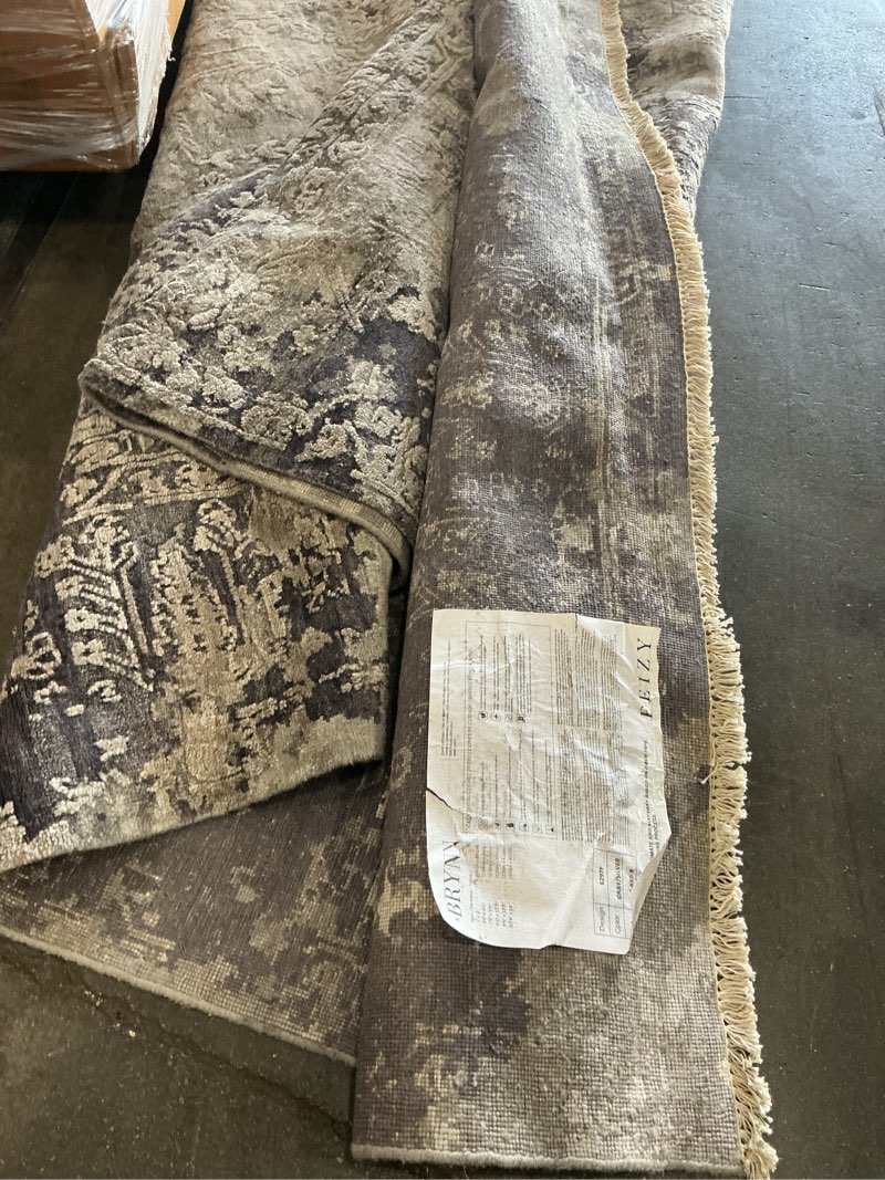 Condition photo showing As Is for feizy brynn collection gray/silver area rug (7’6”x9’8”)