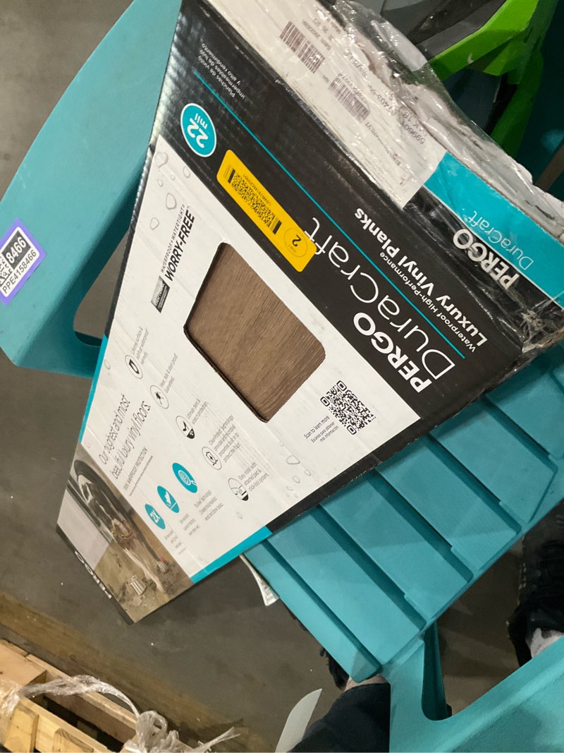 Condition photo showing As Is for pergo duracraft seville oak brown 22-mil x 9-1/2-in w x 47-in l waterproof interlocking luxury vinyl plank flooring (18.78-sq ft/ carton)