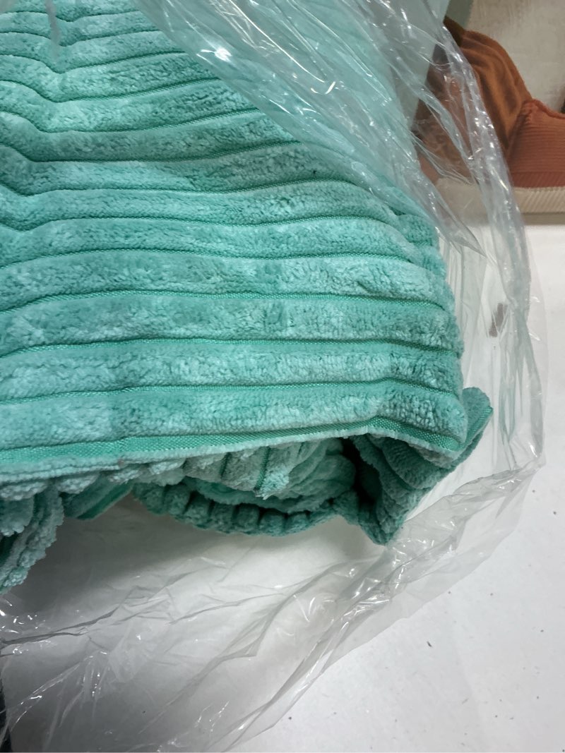 Condition photo showing Good Condition for HAUSSY Turquoise Decorative Throw Pillow Covers 24x24 Inch Set of 2,Soft Solid Corduroy Striped Cushion Case,Square Euro Pillow Shams,Winter Home Decorations for Couch,Bed Turquoise 24" x 24" (Pack of 2)