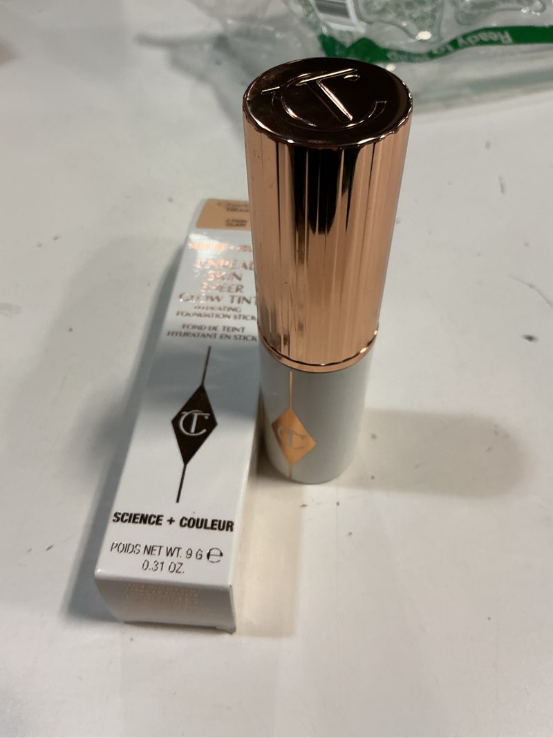 Condition photo showing New/Like New for Charlotte Tilbury Unreal Skin Sheer Glow Tint Hydrating Foundation Stick, Size: 0.31 Oz, 4 Fair