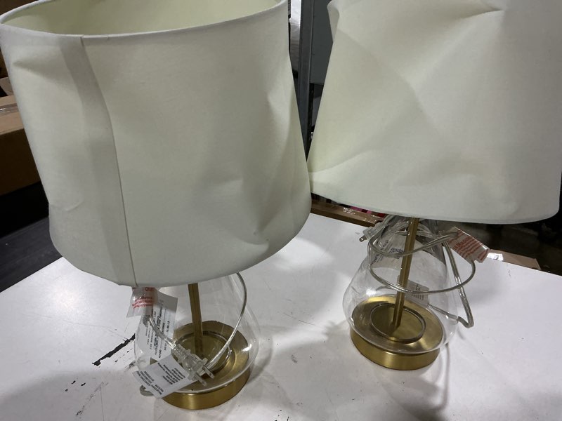 Condition photo showing As Is for 20-inch tall clear glass refillable table lamp with white shade (bulb not included) (set of 2)