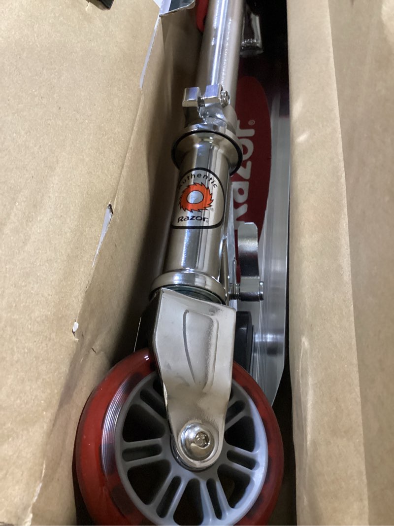 Condition photo showing New/Like New for razor a kick scooter for kids - lightweight, foldable, aluminum frame, and adjustable handlebars red