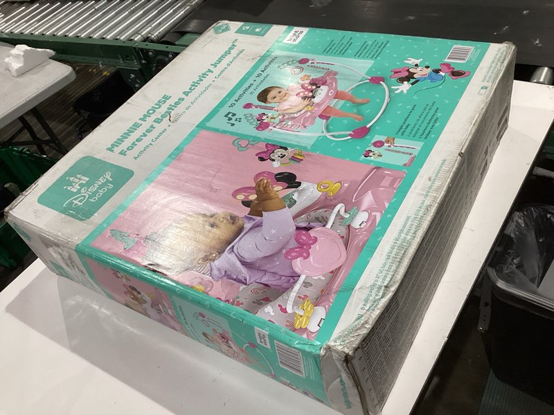 Condition photo showing New/Like New for bright starts disney baby minnie mouse forever besties baby activity center jumper with 10 toys, lights & sounds, 360-degree seat, 6-12 months (pink)