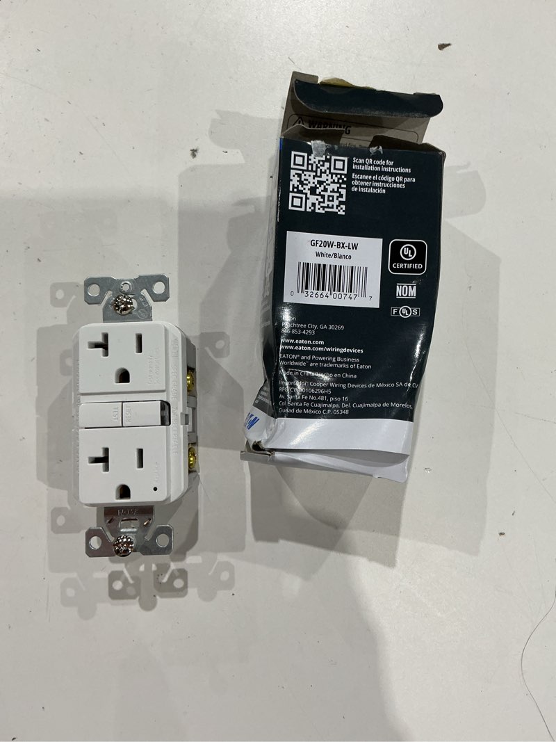 Condition photo showing As Is for eaton 20-amp 125-volt gfci residential decorator outlet, white