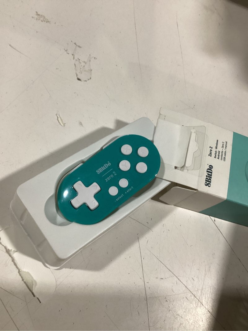 Condition photo showing Good Condition for 8bitdo zero 2 bluetooth gamepad keychain sized mini controller for switch, windows, android, macos & raspberry pi(turquoise edition)