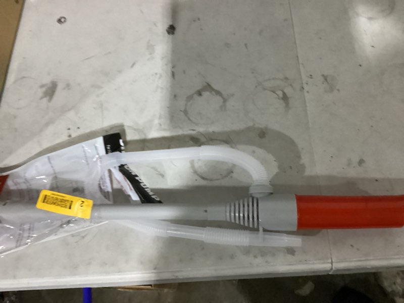 Condition photo showing New/Like New for dyna-glo battery operated plastic 22.5 in. siphon pump