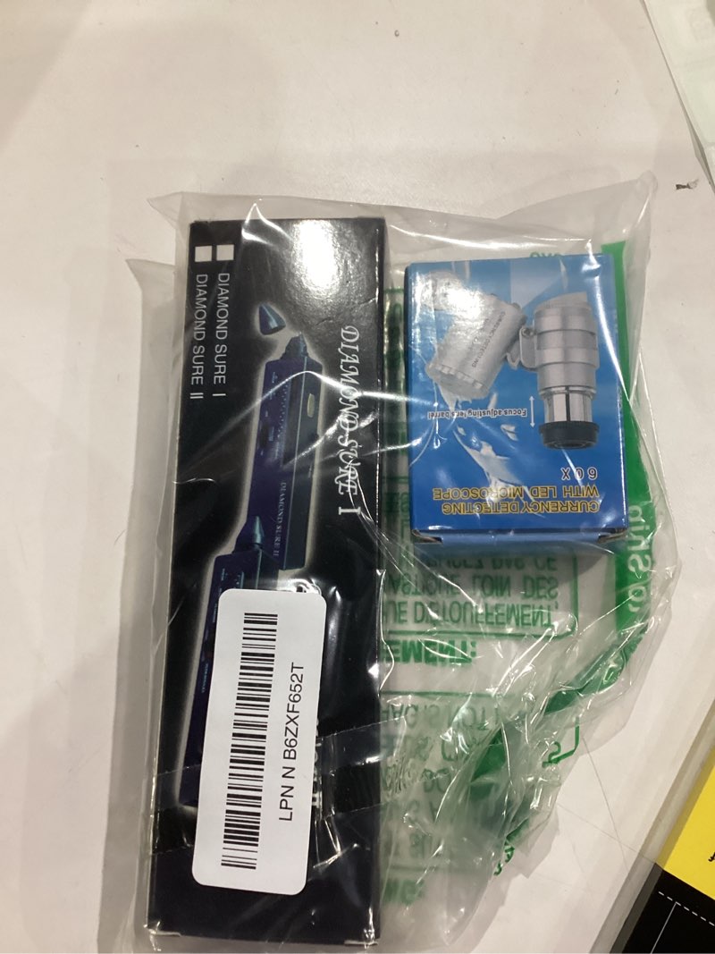 Condition photo showing Good Condition for Diamond Tester Professional Diamond Tester Pen with UV Light, 60X Mini LED Magnifying, Jewelry Gem Tester Pen, Professional Diamond for Novice and Expert?Battery Included?