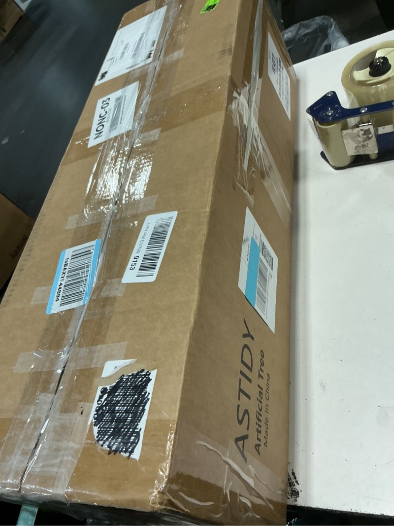 Condition photo showing Good Condition for Artificial Dracaena Tree 5FT - Fake Tree with Black Tall Planter - Faux Yucca Tall Fake Floor Plant in Pot - Artificial Plant for Home Office Living Room Decor Indoor Black 5ft