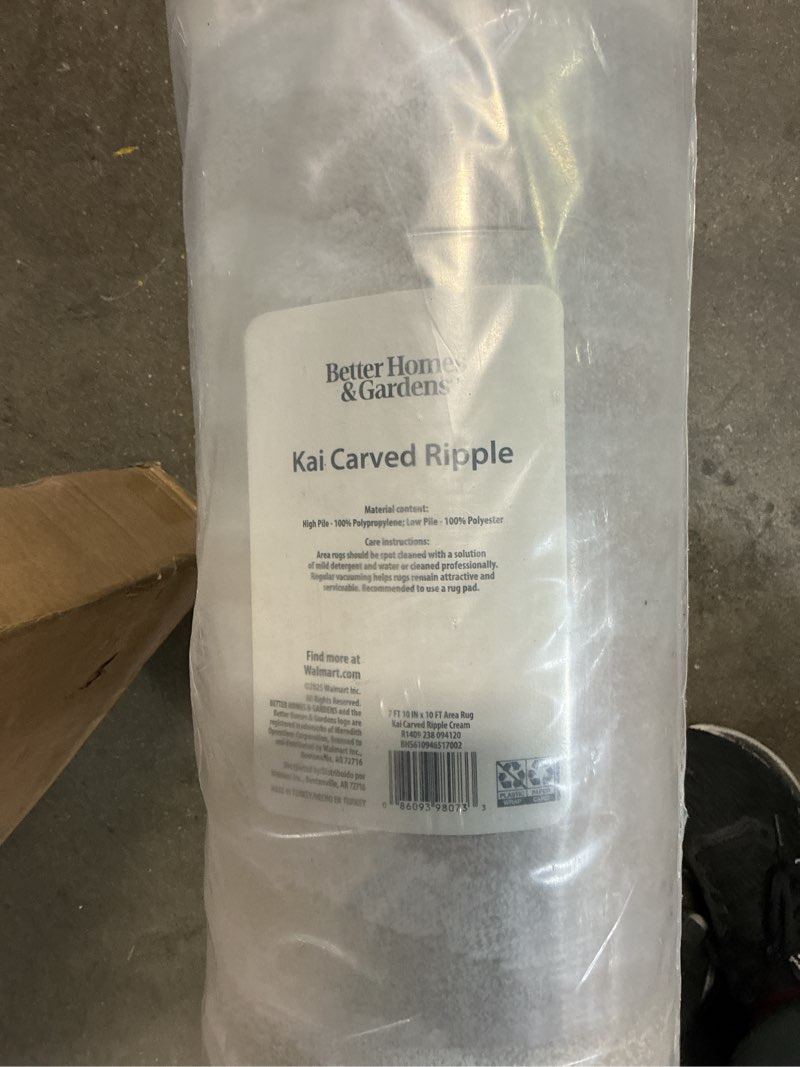 Condition photo showing New/Like New for better homes & gardens kai carved ripple indoor stain/fade resisant area rug  cream  7 10  x 10