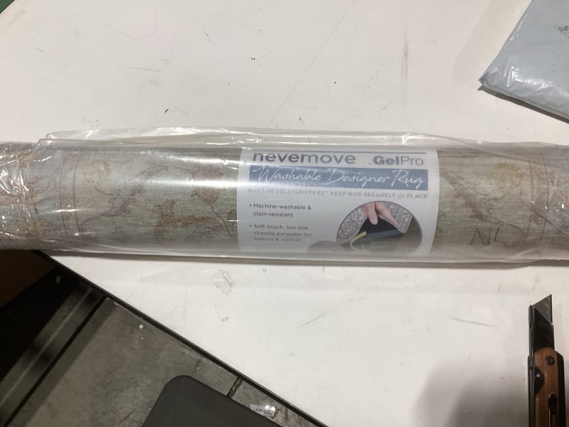 Condition photo showing As Is for NeverMove Machine Washable Bella Area Rug, 5x8, Khaki Khaki 5' x 8' (Rectangular)