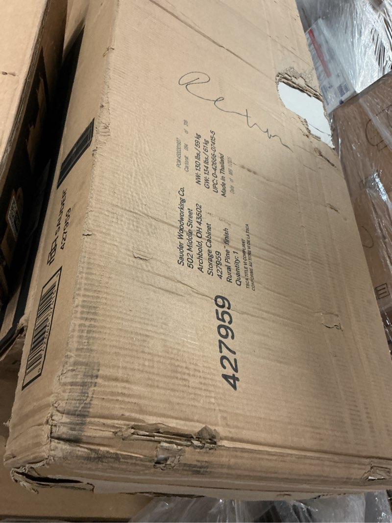 Condition photo showing Good Condition for sauder 2-door swing out storage cabinet, rural pine finish