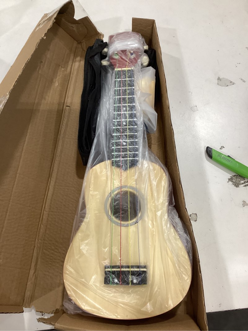 Condition photo showing item condition for Everjoys Soprano Ukulele Beginner Pack-21 Inch w/Rainbow String Free Online Lesson Gig Bag Digital Tuner Pick All in One Kit 21 inch Rainbow String
