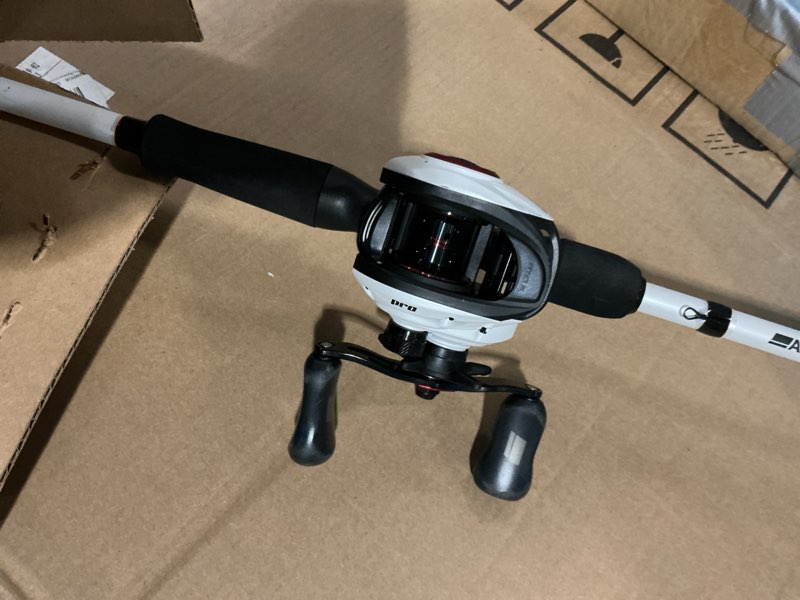 Condition photo showing As Is for Abu Garcia Max Pro Low Profile Baitcast Reel and Fishing Rod Combo