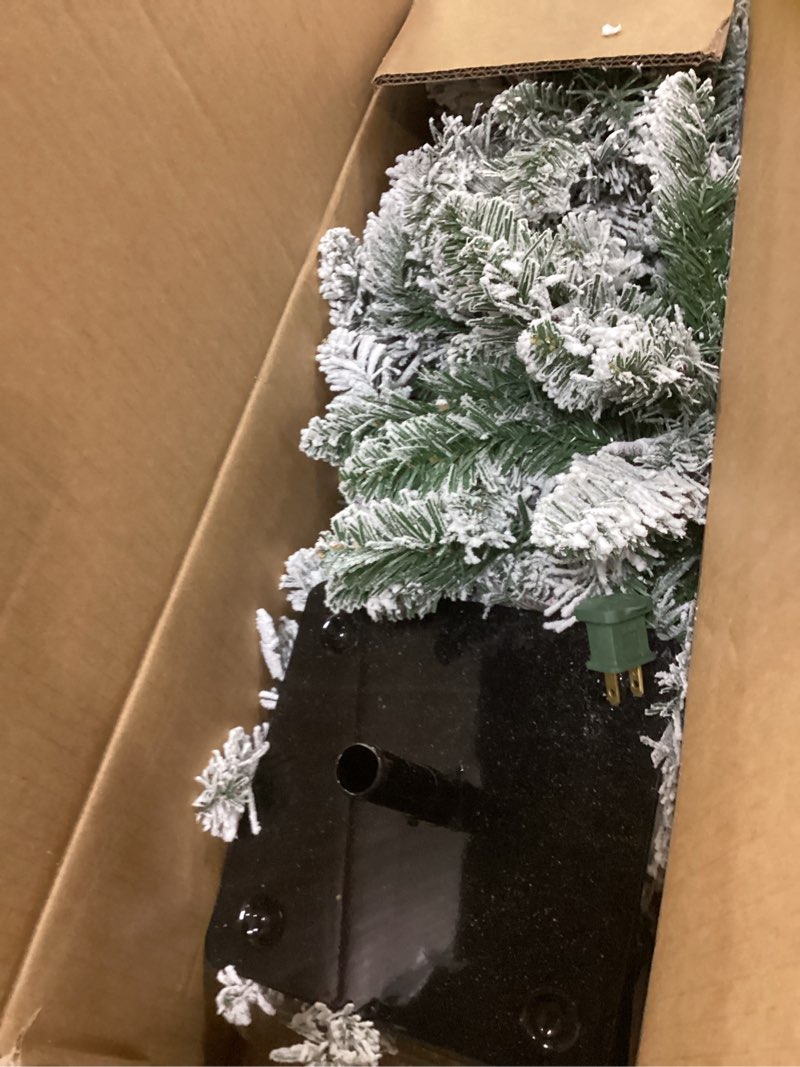 Condition photo showing Good Condition for Puleo International 4 ft Pre-lit Flocked Alpine Pencil Tree 139 Tips 50 UL Multi-Color Lights