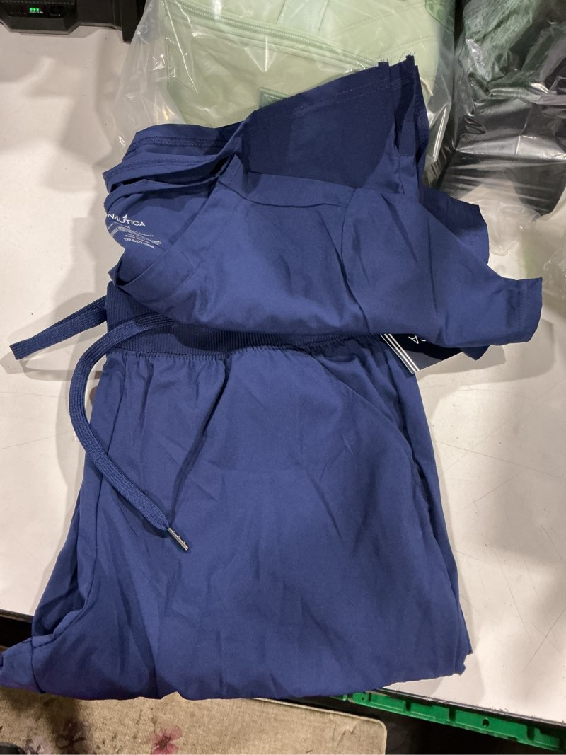 Condition photo showing Good Condition for nautica women's scrub set, 9-pocket breathable & stretchy pants & tops navy medium