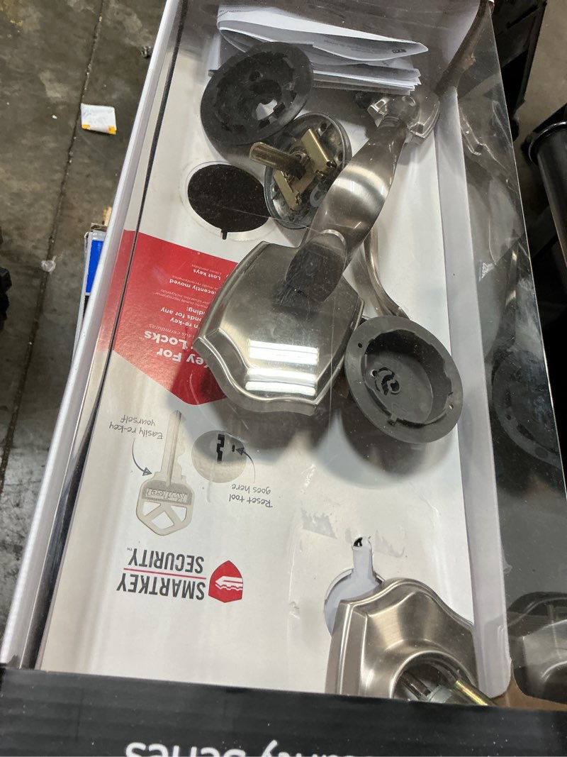 Condition photo showing As Is for kwikset belleview satin nickel single deadbolt keyed entry door handleset with balboa lever and smartkey