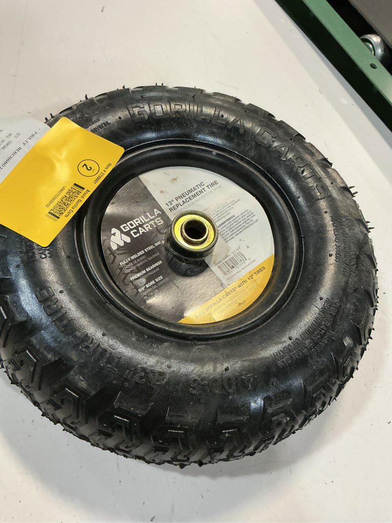Condition photo showing As Is for 13 in. pneumatic replacement tire