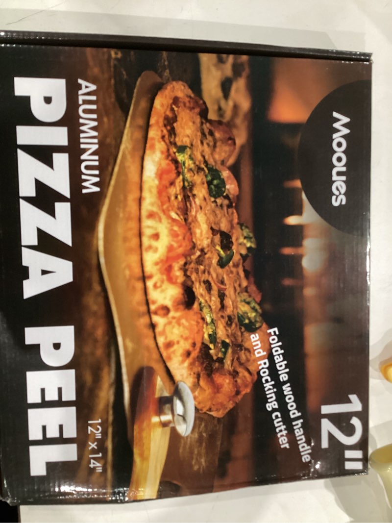Condition photo showing Good Condition for Pizza Peel Aluminum Pizza Spatula, Mooues 12 inch Metal Pizza Paddle(12"x 14")with Rocker Cutter Foldable Wood Handle, [Storage bag included], for Family Pizza Oven Baking Pizza, Dough, Bread & Pastry Pizza Peel 12"x 14" with Rocker Cutter