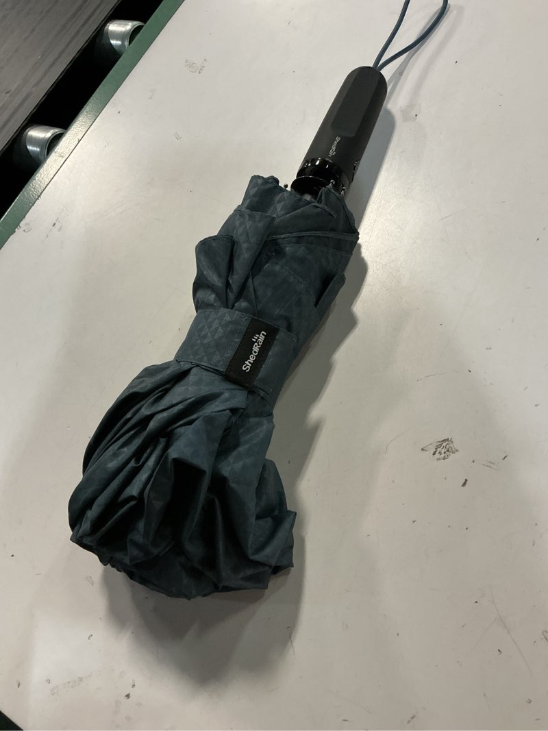 Condition photo showing As Is for shedrain vortex compact folding travel umbrella – push-button open & close, vented double canopy, protects from rain, sun, & wind charcoal