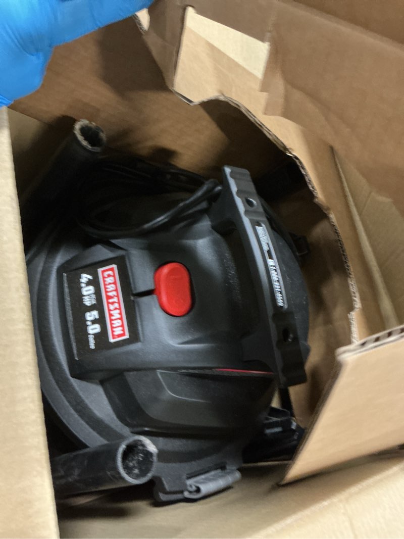 Condition photo showing As Is for Craftsman 5-Gallons 4-HP Corded Wet/Dry Shop Vacuum with Accessories Included Visit 4.2 (324) · Brand: CRAFTSMAN