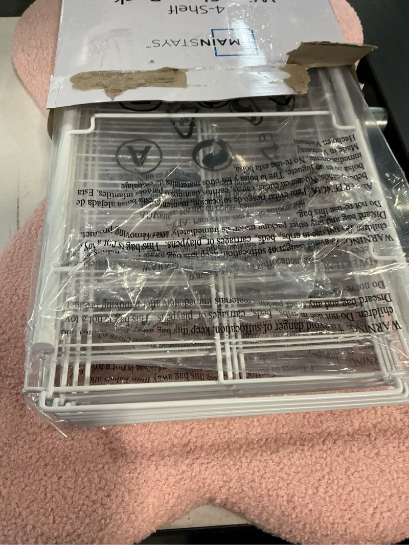 Condition photo showing Good Condition for mainstays 4-tier steel wire shoe organizer  holds up to 12 pairs  arctic white
