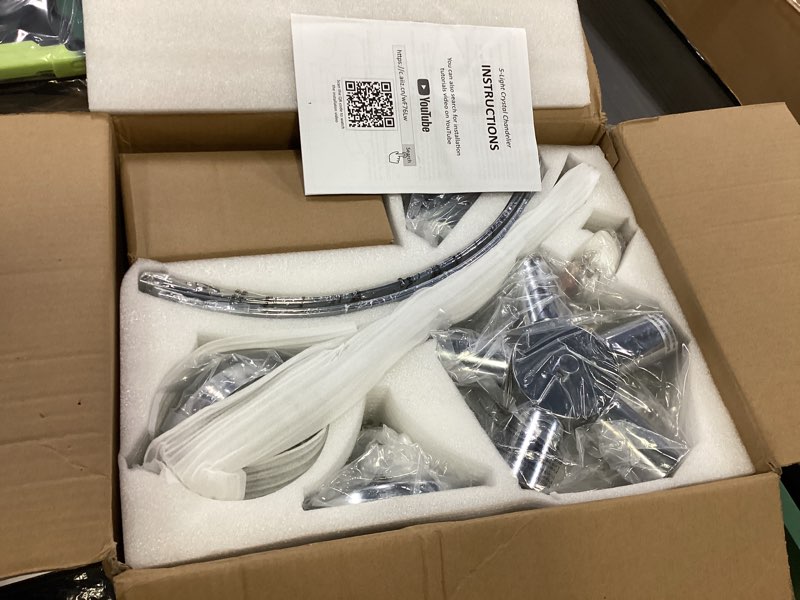 Condition photo showing New/Like New for Modern Chrome Crystal Chandelier, 20 Inch Large Ceiling Pendant Light Fixture with 50'' Adjustable Hanging Chain, 5-Light Farmhouse Chandelier for Dining Room, Living Room, Bedroom, Entryway