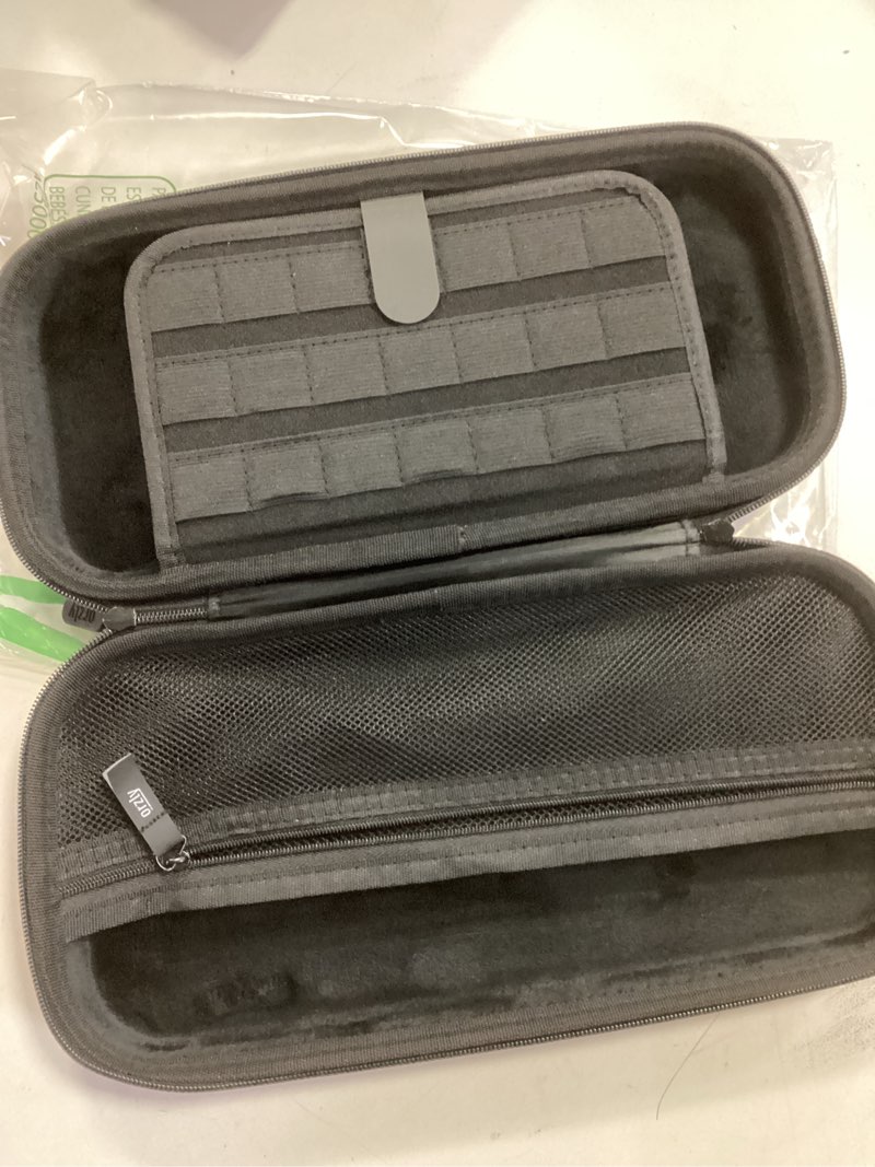 Condition photo showing Good Condition for Orzly Carrying Case for Nintendo Switch OLED Console with Accessories and Game Storage Compartment - Easy Clean Case Gift Boxed While (similar item)
