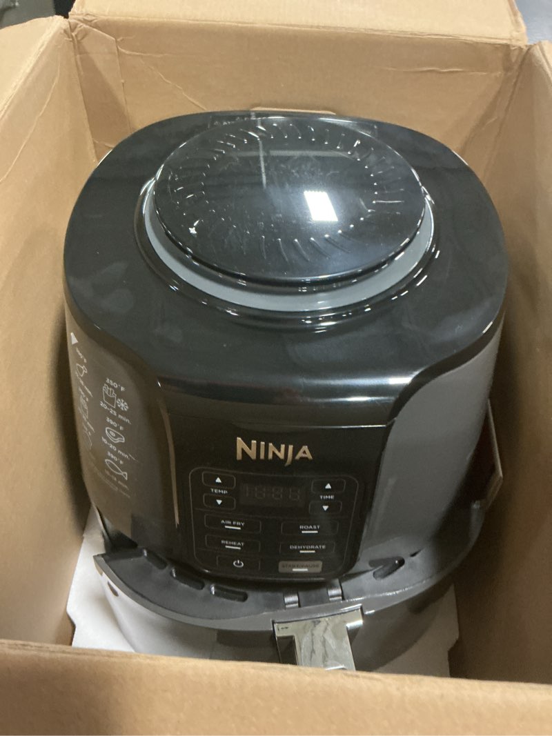Condition photo showing As Is for Ninja 4qt Air Fryer - Black AF101: Stainless Steel, 1550W, Digital Control, Dishwasher-Safe, 1-Year Warranty