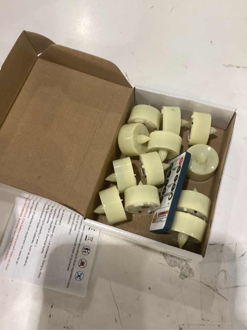 Condition photo showing Good Condition for homemory 12pcs flameless led tea lights with remote & timer, 400+hours realistic flickering battery candles for seasonal, tabletop, and centerpieces decor warm white glow, ivory base pack of 12