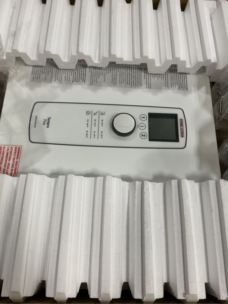 Condition photo showing As Is for Stiebel Eltron Tankless Water Heater – Tempra 29 Plus – Electric, On Demand Hot Water, Eco, White 29 (kW) Tempra Plus