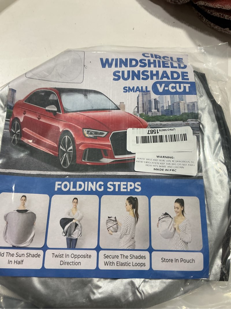 Condition photo showing Good Condition for foldable car windshield sun shade – 280t thickened reflective uv & heat shield with storage bag, keeps interior cool, universal fit for sedans, suvs & trucks – medium (64" x 32")